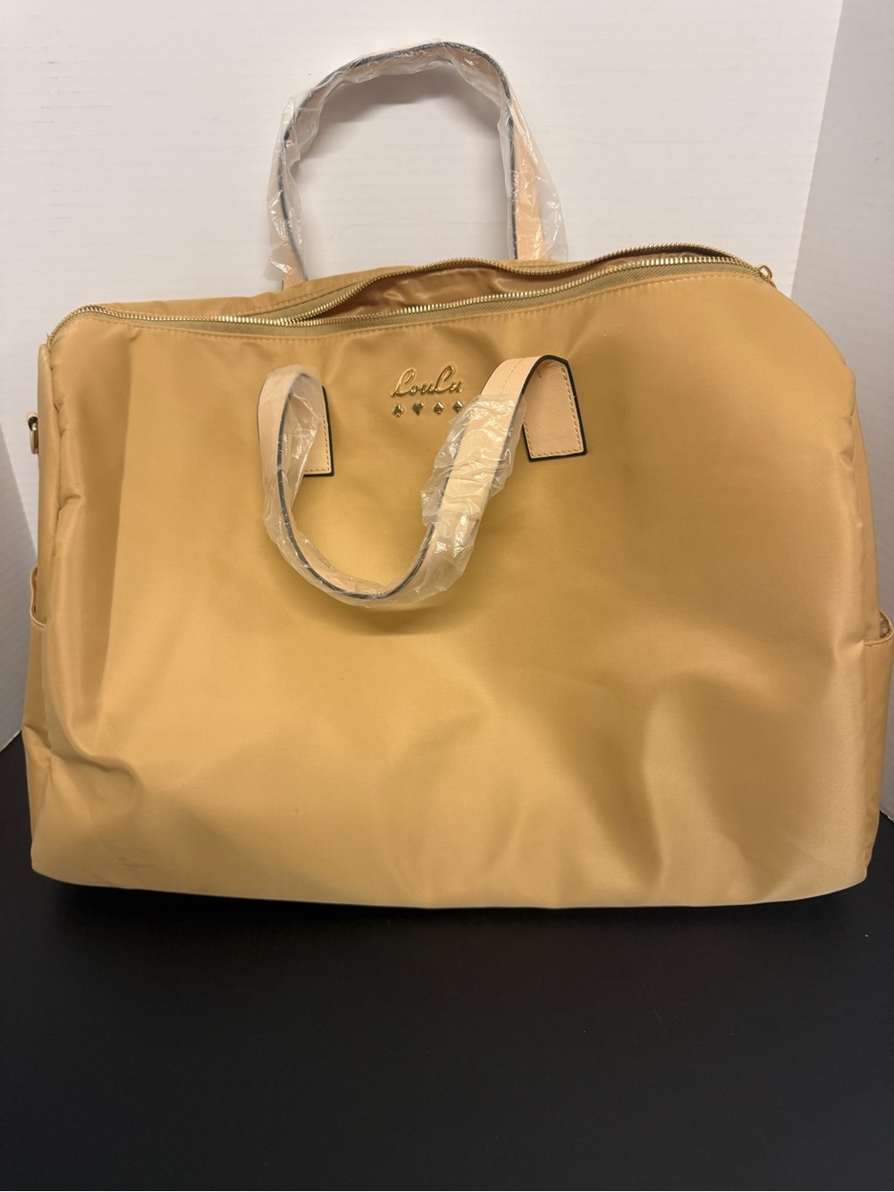 LouLu Gold Duffle. Brand new.
